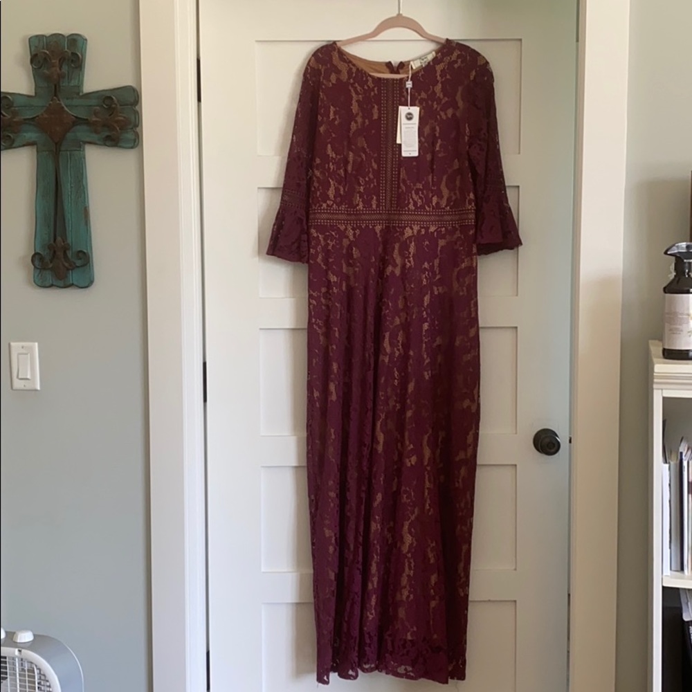 Long dress with 3/4 bell sleeves.